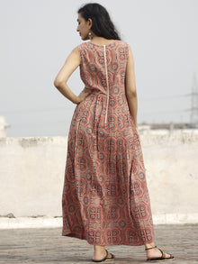 Red Maroon Black Ivory Long Sleeveless Ajrakh Hand Block Printed Cotton Dress With Knife Pleats & Side Pockets - D32F682